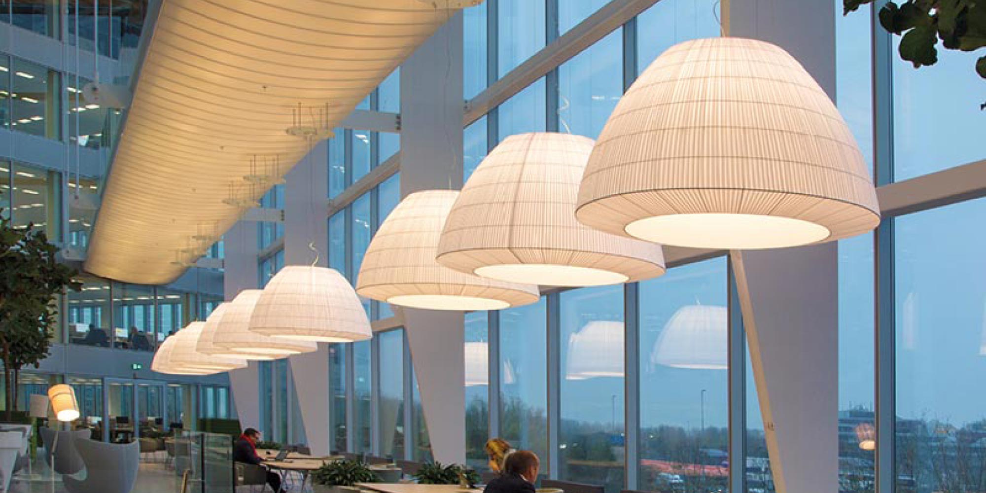 As a professional, you know that productivity is crucial to success. Acoustic lighting solutions are critical to dampening the rolling echo of noise in an open co-working space or office plan.